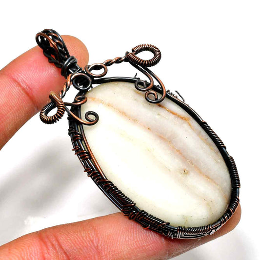 Gaia’s Embrace – Copper-Wrapped Agate Pendant