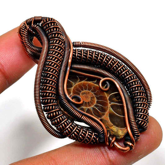 Ancient Echo – Copper-Wrapped Fossil Pendant