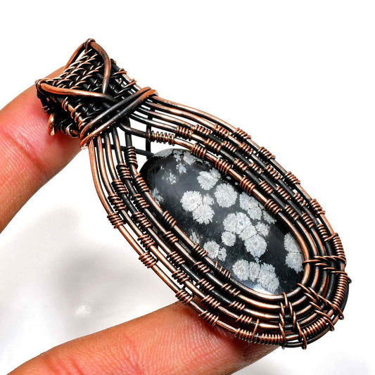 Winter’s Whisper – Snowflake Obsidian Copper Pendant