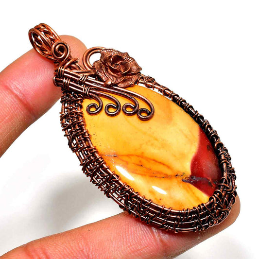 Ember’s Embrace – Handwoven Amber & Copper Pendant