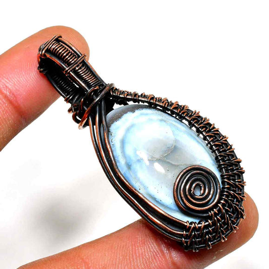 Ocean’s Embrace – Blue Agate Copper Pendant