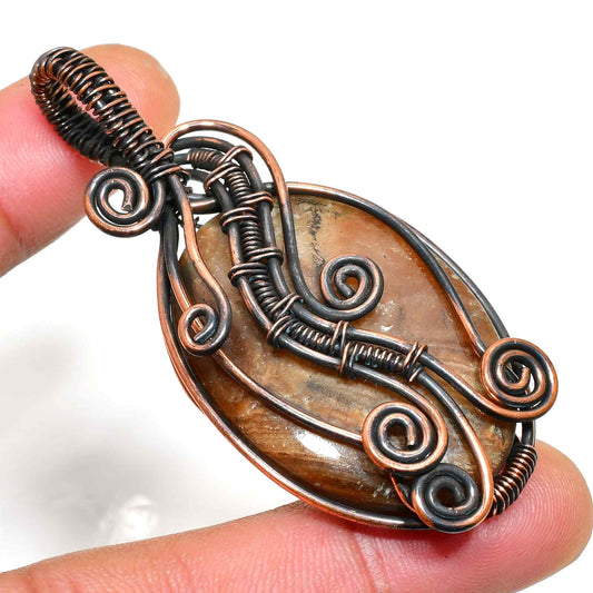 Terra’s Embrace – Brown Agate Copper Pendant