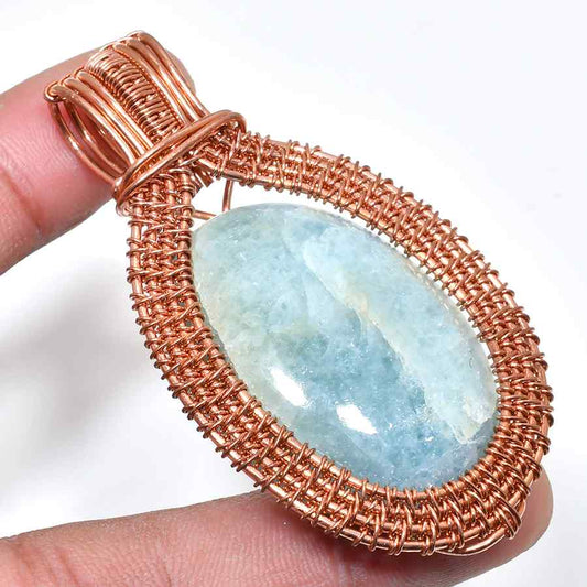 Ocean’s Embrace – Aquamarine Copper Wrap Pendant