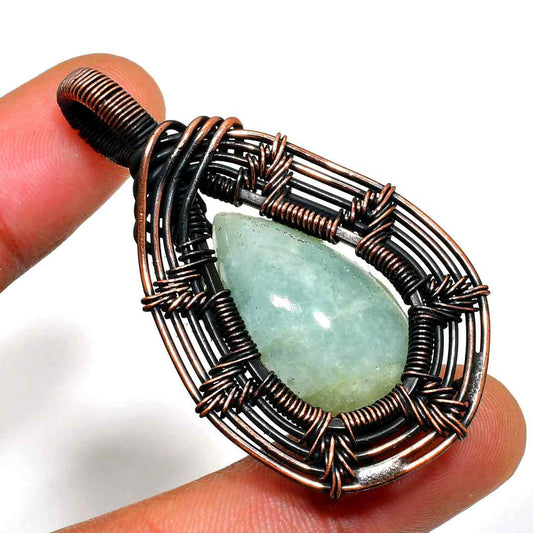 Whispers of Serenity – Aquamarine & Oxidized Copper Pendant