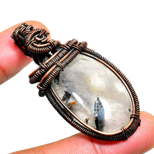 Clarity’s Embrace – Oxidized Copper Quartz Pendant