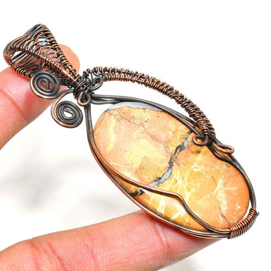 Terra’s Embrace – Copper-Wrapped Earthstone Pendant