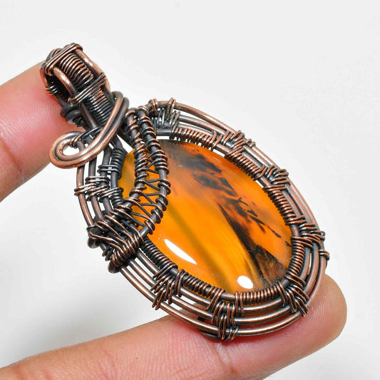 Amber Glow – Tarnished Copper Wrapped Amber Pendant