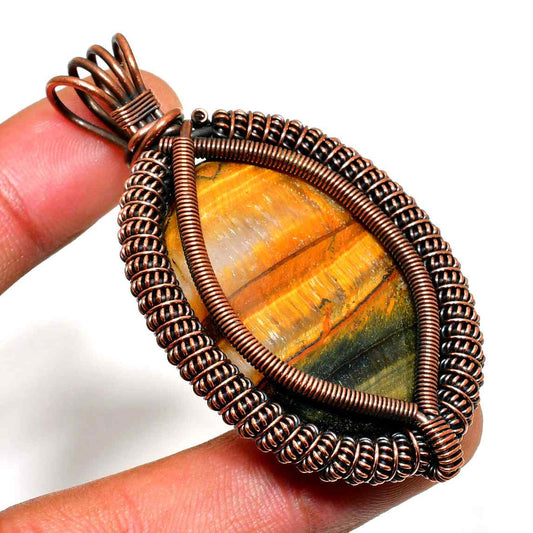 Eldric’s Radiance – Tiger’s Eye Copper Pendant