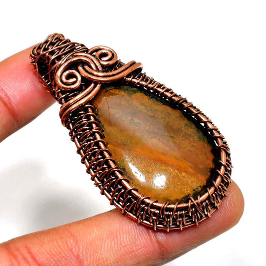 Gaia’s Embrace – Copper-Wrapped Stone Pendant