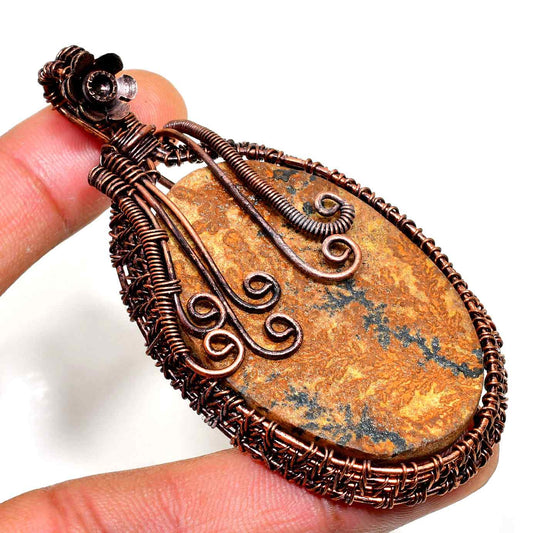 Ember’s Embrace – Copper-Wrapped Earthstone Pendant