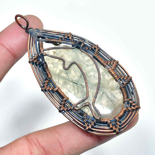 Clarity’s Embrace – Quartz & Oxidized Copper Pendant