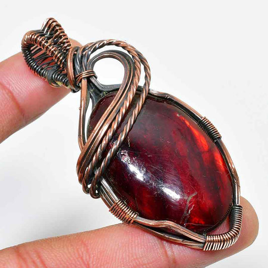 Ember’s Embrace – Garnet & Copper Pendant