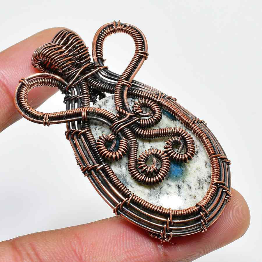 Gaia’s Embrace – Oxidized Copper & Natural Stone Pendant