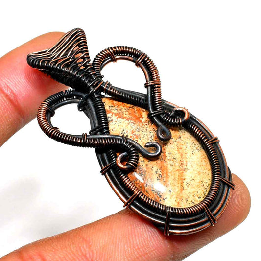 Earth’s Embrace – Copper-Wrapped Gemstone Pendant