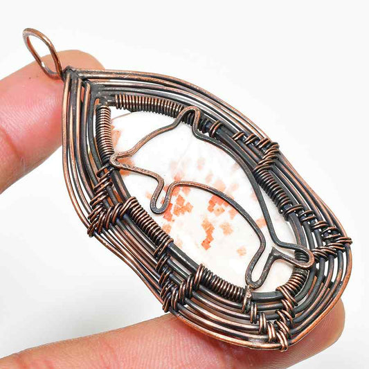 Ocean’s Harmony – Copper-Wrapped Dolphin Pendant