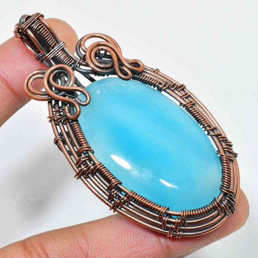 Serenity’s Embrace – Blue Agate Copper Pendant