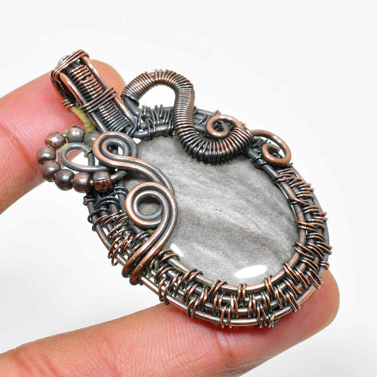 Terra’s Embrace – Copper-Wrapped Stone Pendant