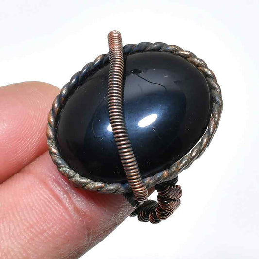 Onyx Embrace – Aged Copper Protection Ring