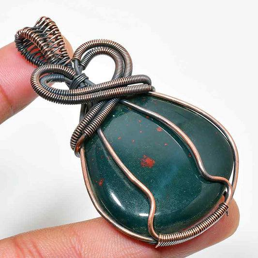 Serenity’s Embrace – Handcrafted Copper Bloodstone Pendant