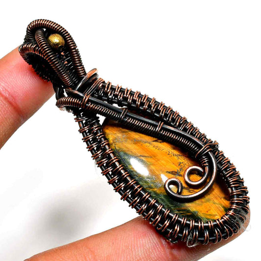Terra’s Embrace – Copper-Wrapped Stone Pendant