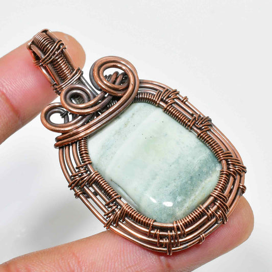 Nature’s Embrace – Green Stone Copper Pendant
