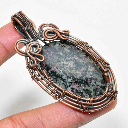 Elysia’s Embrace – Rhodonite Copper Pendant