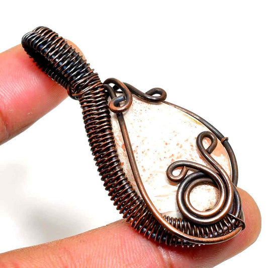 Ocean’s Embrace – Oxidized Copper Seashell Pendant