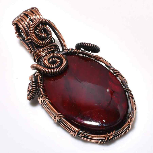 Ember’s Embrace – Garnet Copper Pendant