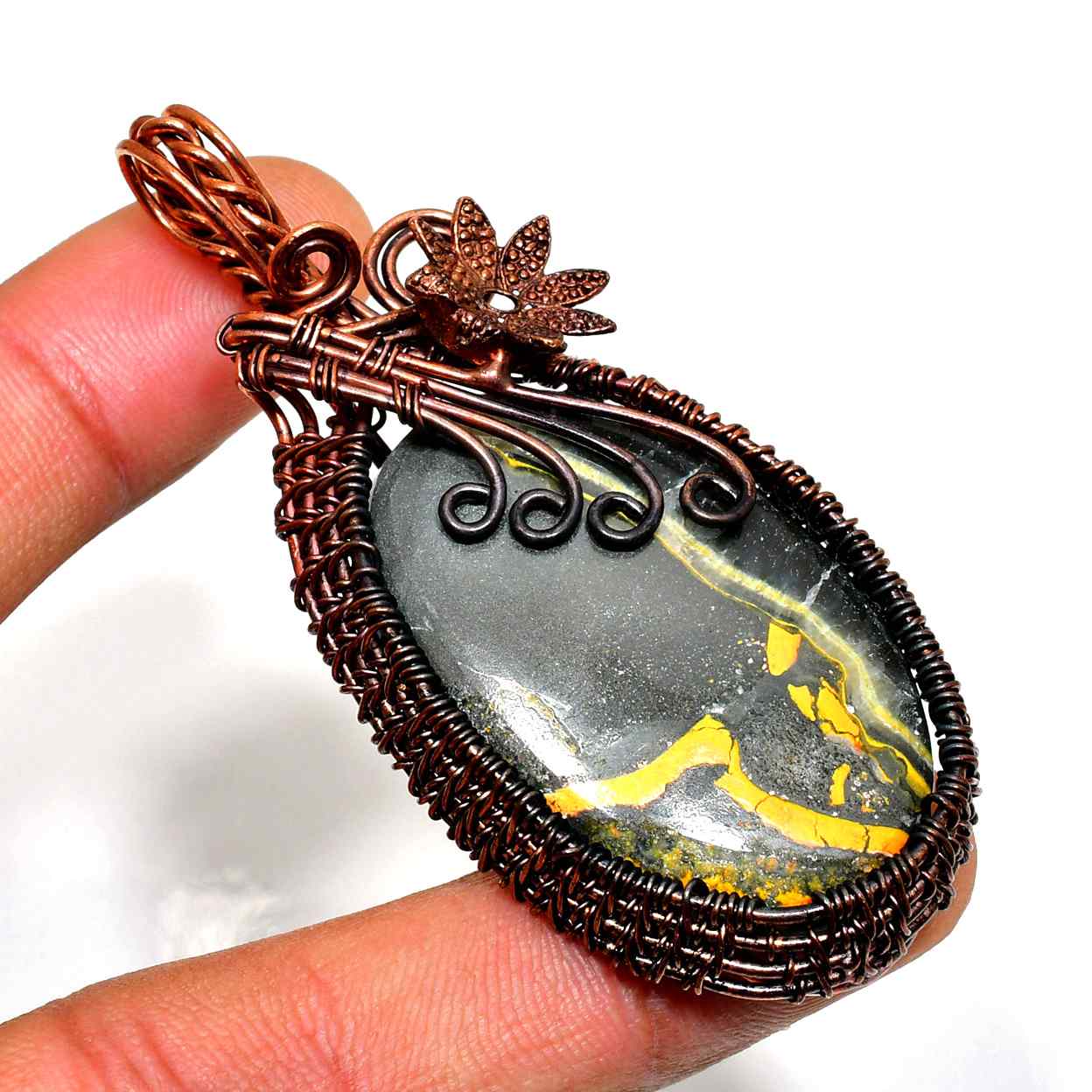Earth’s Embrace – Black & Yellow Jasper Copper Pendant