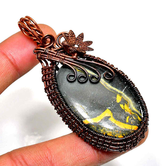 Earth’s Embrace – Black & Yellow Jasper Copper Pendant
