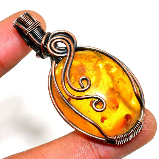 Amber’s Embrace – Oxidized Copper Pendant