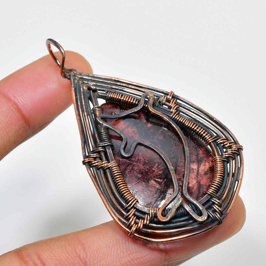 Dolphin’s Embrace – Garnet & Blackened Silver Wire Pendant