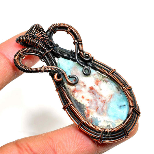 Ocean’s Embrace – Copper-Wrapped Opal Pendant