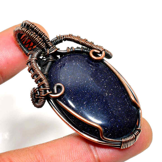 Celestial Radiance – Blue Goldstone Copper Pendant