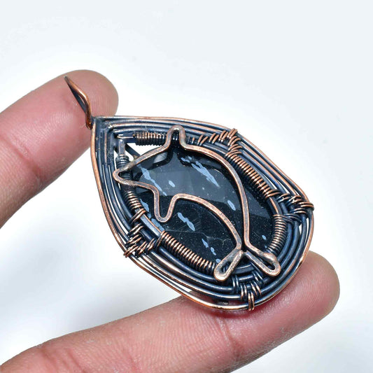 Dolphin’s Embrace – Black Stone & Copper Dreamcatcher Pendant