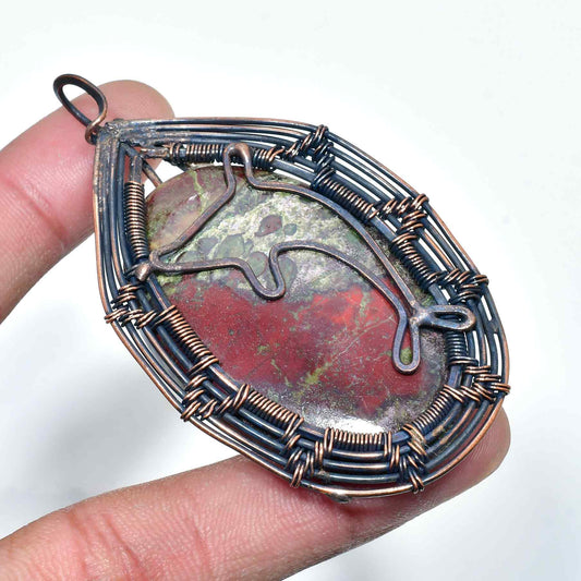 Ember’s Embrace – Raw Gemstone Copper Pendant