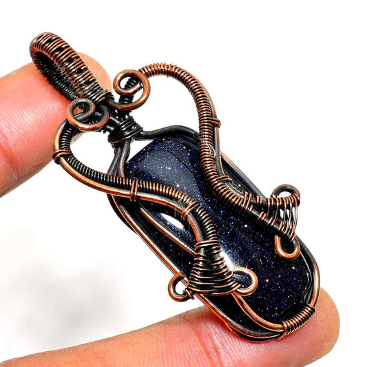Starlit Embrace – Blue Goldstone & Copper Pendant