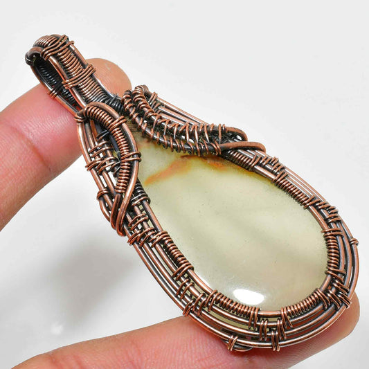 Gaia’s Embrace – Oxidized Copper & Natural Stone Pendant
