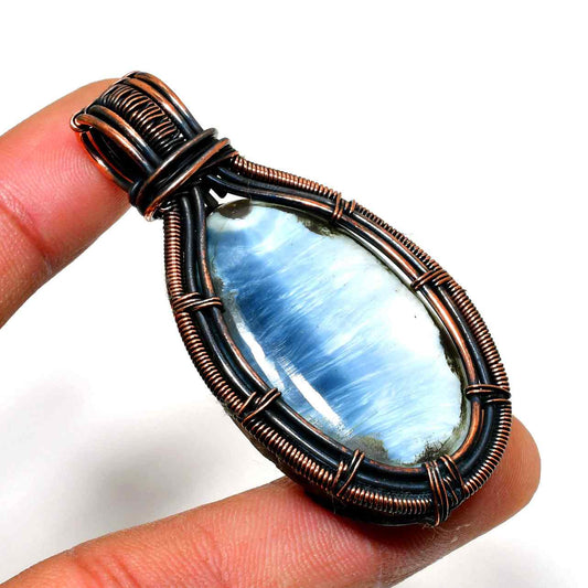 Serenity’s Embrace – Blue Lace Agate Copper Pendant