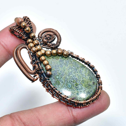 Gaia’s Embrace – Greenstone Copper Pendant