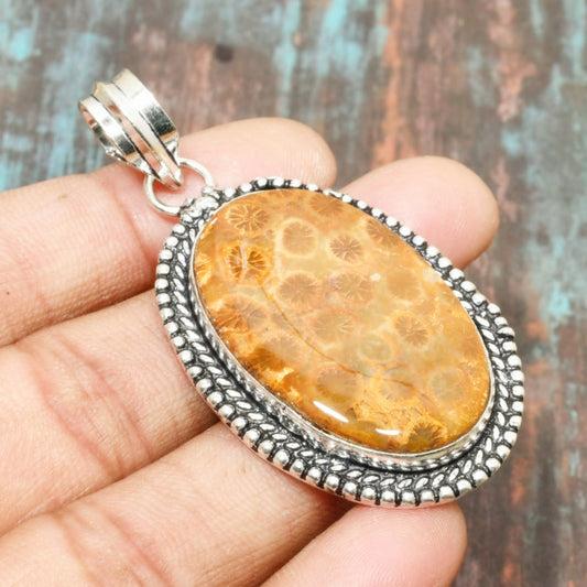 Solara’s Glow – Golden Coral Sterling Pendant