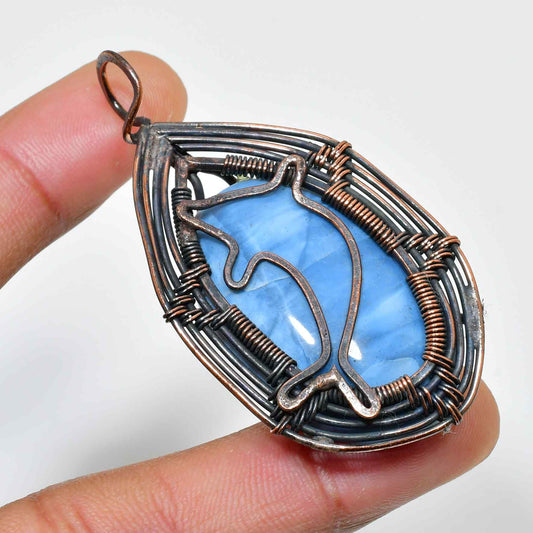 Dolphin’s Embrace – Aquamarine Copper Pendant