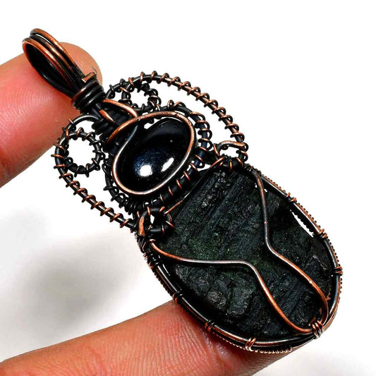 Obsidian Embrace – Oxidized Copper Pendant