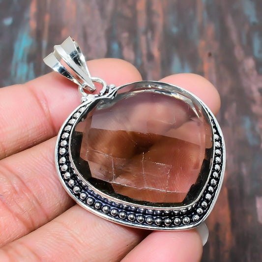Amara’s Heart – Faceted Quartz & Silver Pendant
