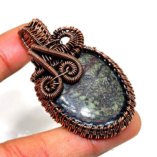 Verdant Embrace – Oxidized Copper Pendant