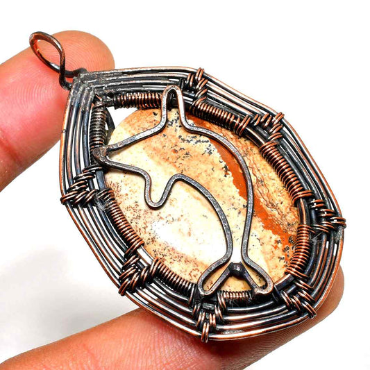 Earth’s Embrace – Copper-Wrapped Marble Pendant