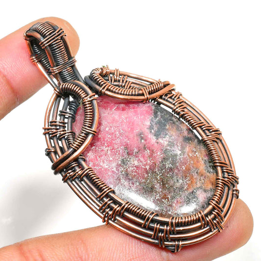 Love’s Embrace – Rhodochrosite Copper Pendant