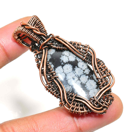 Eira’s Harmony – Snowflake Obsidian Copper Pendant