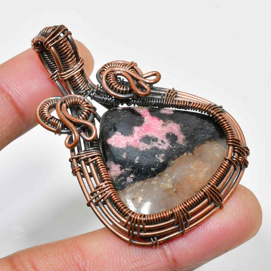 Compassion’s Embrace – Rhodochrosite Copper Pendant