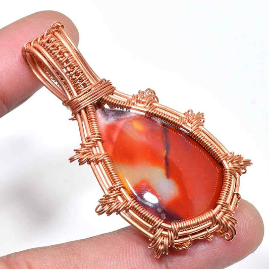 Ember’s Essence – Copper-Wrapped Orange Agate Pendant